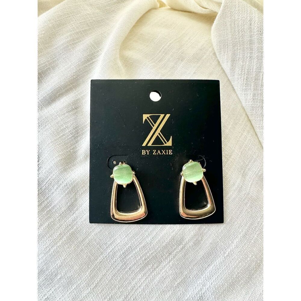 BY ZAXIE gold color dangle earrings with light green cat eye stone